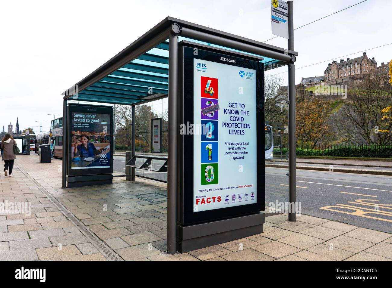 Edinburgh, Scotland, UK. 14 November 2020. Views of Edinburgh city centre on Saturday afternoon during a level 3 lockdown imposed by the Scottish Government;.Pictured; Coronavirus health advisory notices on video displays on bus shelters. Iain Masterton/Alamy Live News. Stock Photo