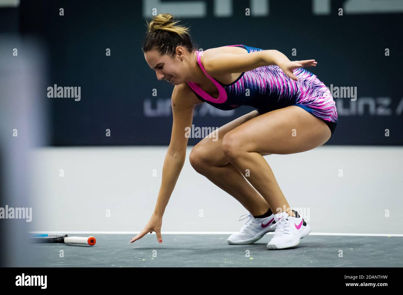 Oceane Dodin of France suffers an ankle injury during the quarter-final against Aryna Sabalenka of Belarus at the 2020 Upper Austr / LM Stock Photo