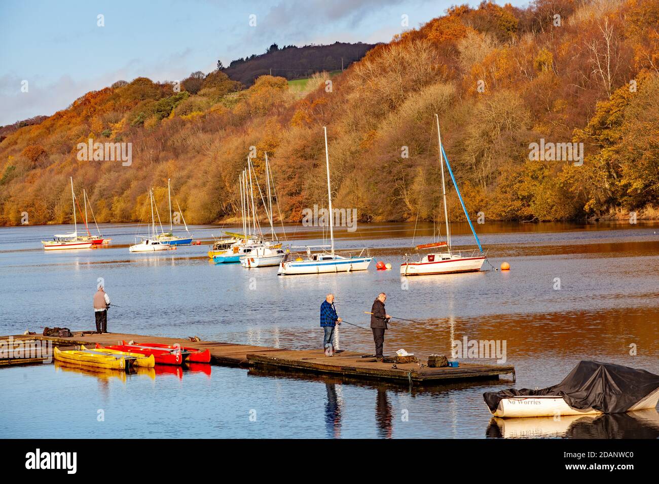 Men fishing on the jetty at Rudyard Lake reservoir in the Stafordshire