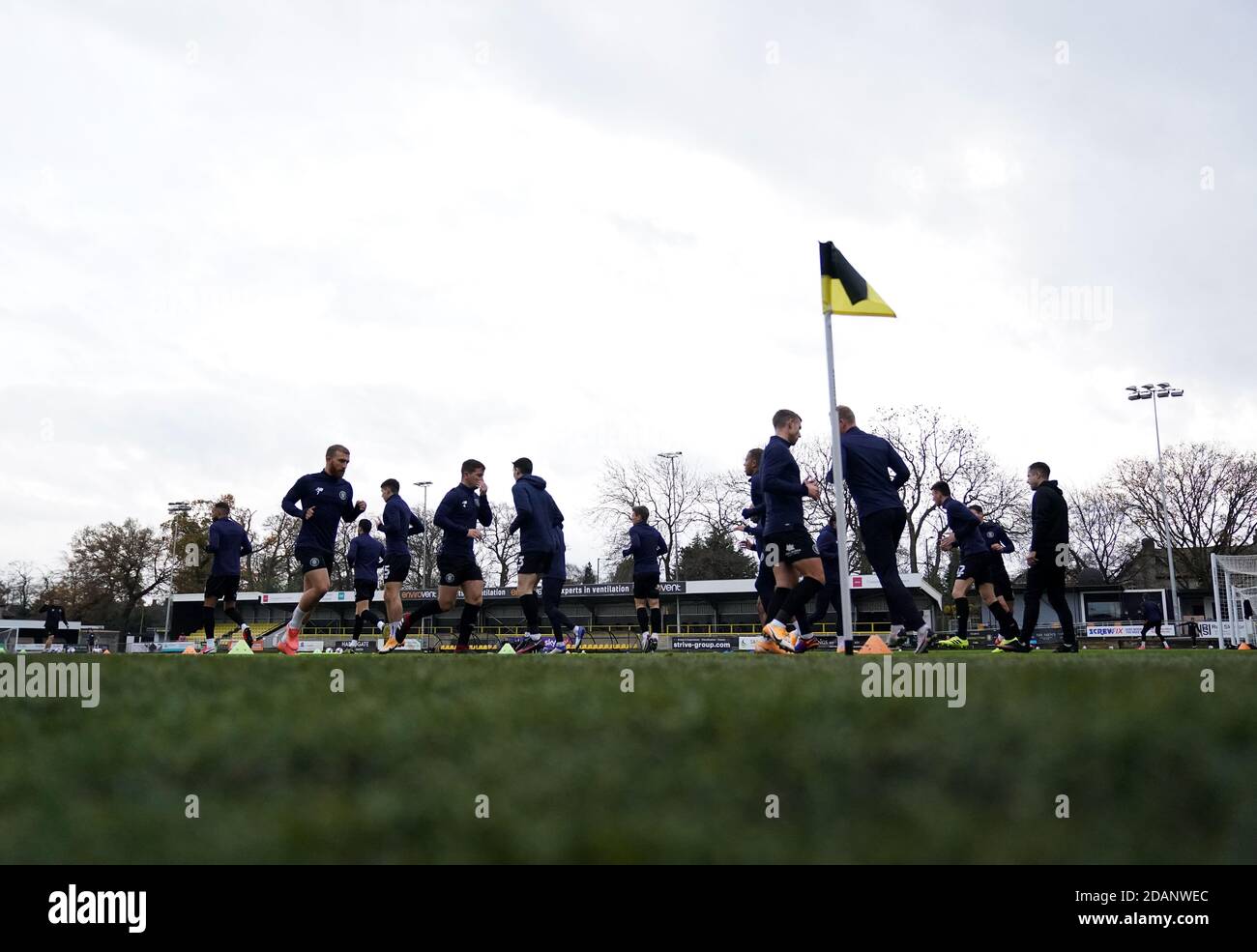 A general view inside the ground as the players warm up before the Sky Bet League Two match at the EnviroVent Stadium, Harrogate. Stock Photo