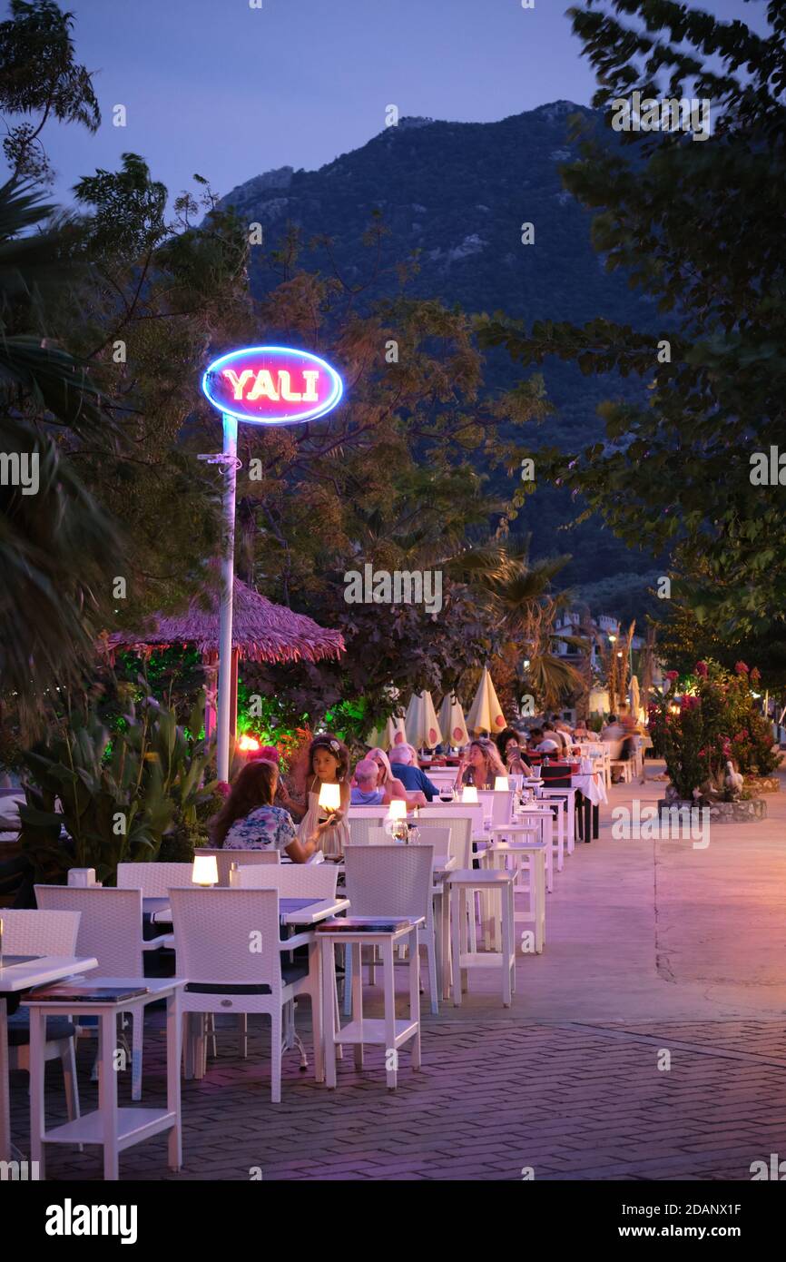 Restaurants in Turunc resort village in the evening, Turkey Stock Photo