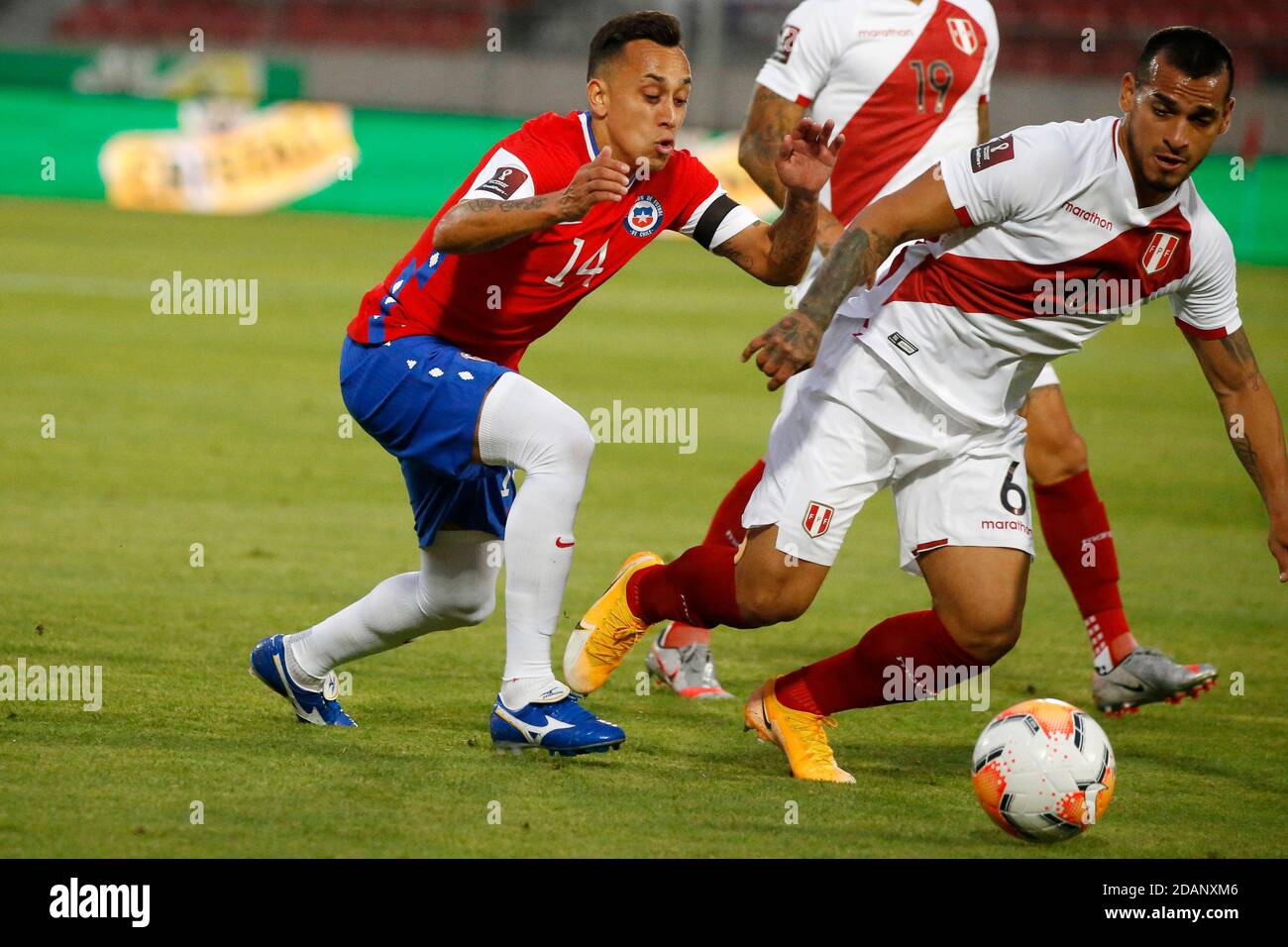 13th November 2020; National Stadium of Santiago, Santiago, Chile; World Cup 2020 Football qualification, Chile versus Peru;  Fabian Orellana of Chile and Miguel Trauco of Peru Stock Photo