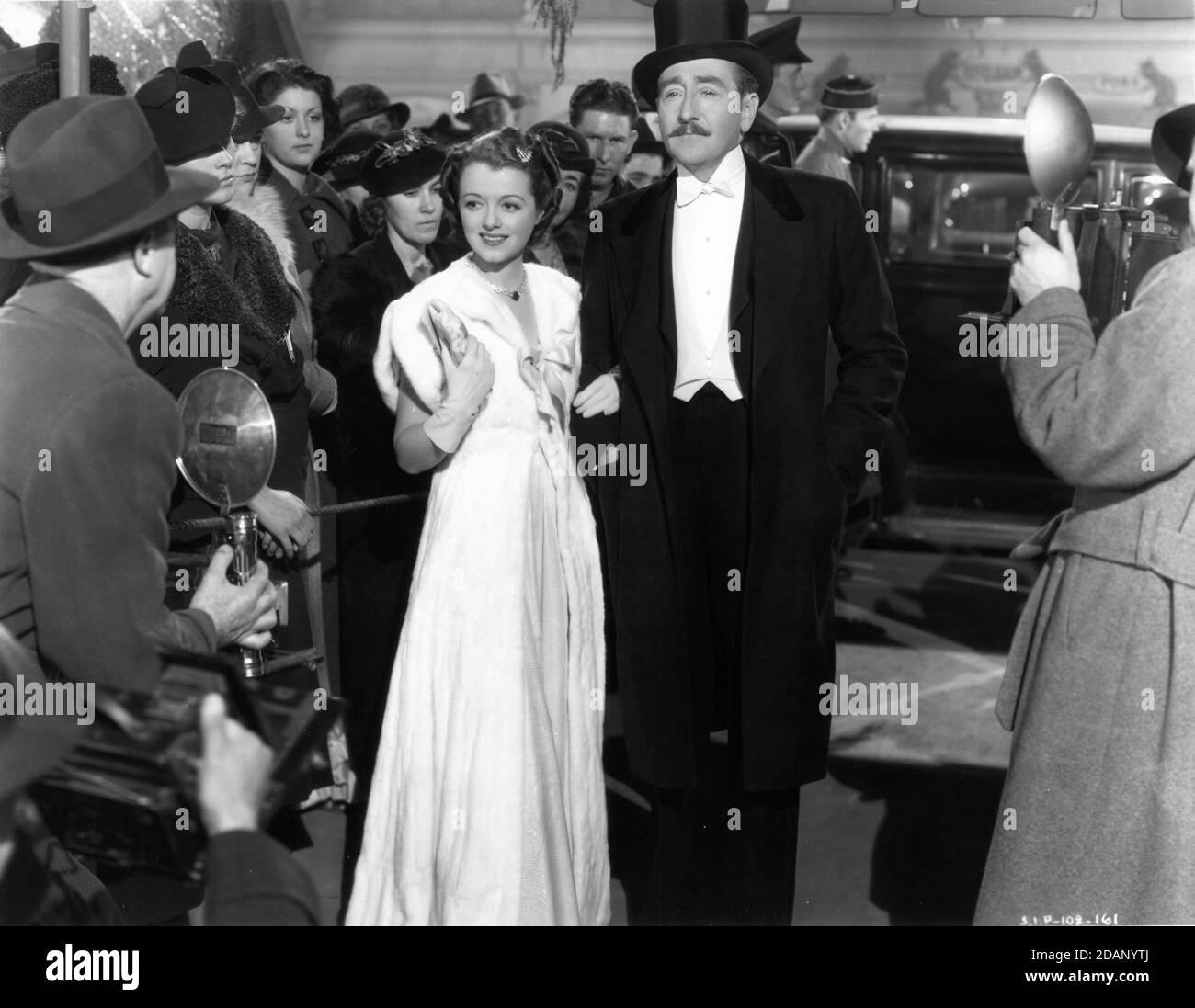 JANET GAYNOR and ADOLPHE MENJOU at Movie Premiere in A STAR IS BORN 1937 director WILLIAM A. WELLMAN story William A. Wellman and Robert Carson screenplay Dorothy Parker Alan Campbell and Robert Carson music Max Steiner producer David O. Selznick Selznick International Pictures / United Artists Stock Photo