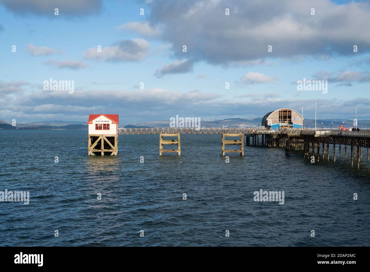 The pier with the old and new lifeboat stations, The Mumbles, Gower Peninsula, near Swansea, South Wales, UK Stock Photo