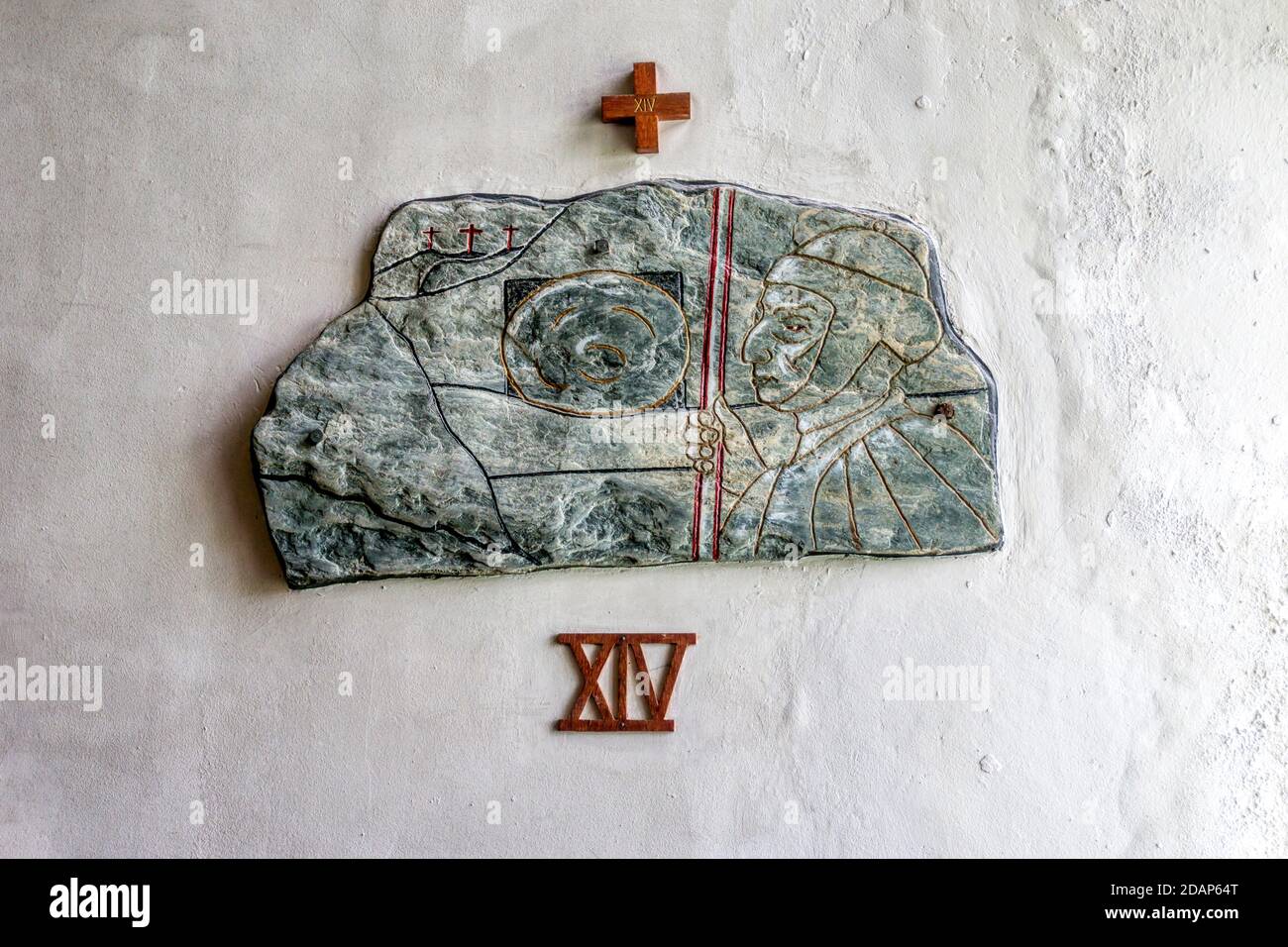 Garrynamonie church, South Uist. Stations of the Cross by Canon Calum MacNeill using local slate. Shown is Station 14 Christ is placed in the tomb. Stock Photo