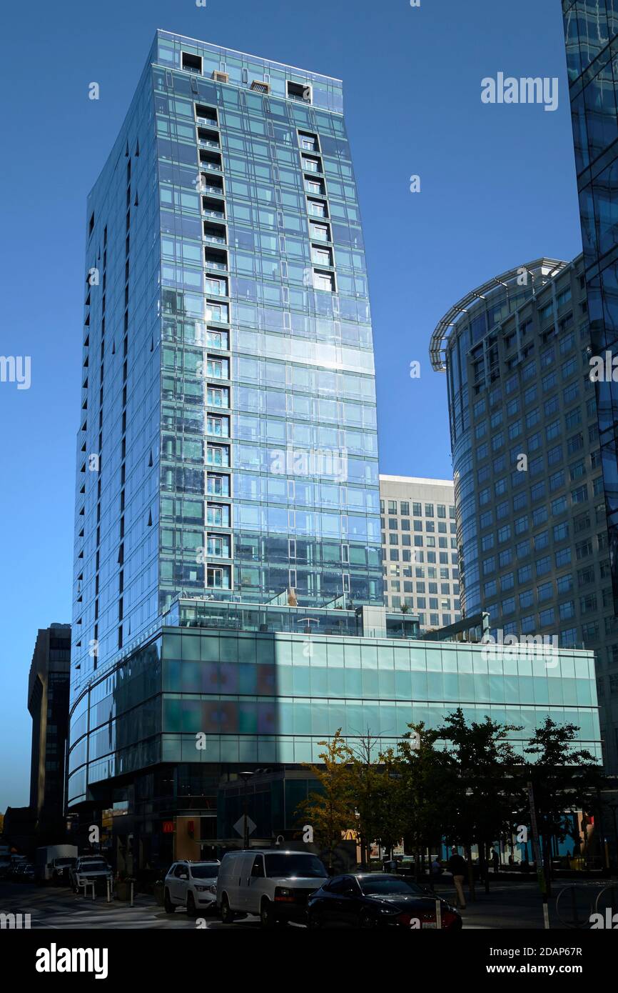 An urban, modern, blue glass apartment building, called Central Place