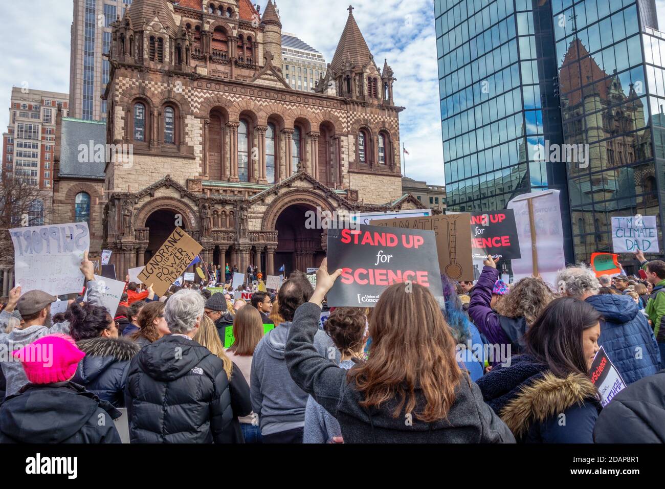 Protesters hold signs at Climate Change Demonstration in Boston, Massachusetts, USA. Stock Photo