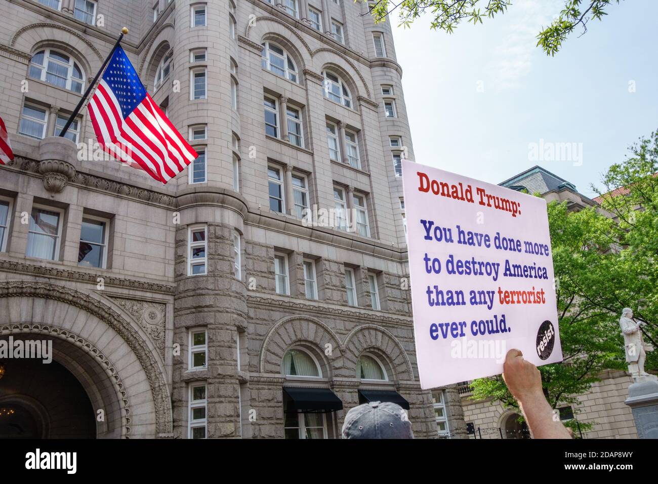 Protesters hold signs at climate change demonstration in Washington, DC, USA. Stock Photo