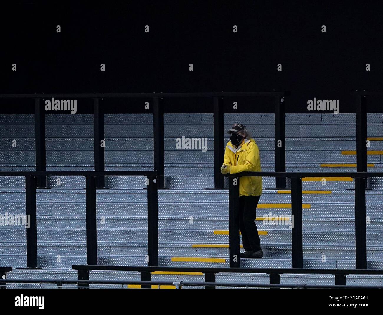 A general view of a fan watching from the stands during the Sky Bet League Two match at the EnviroVent Stadium, Harrogate. Stock Photo