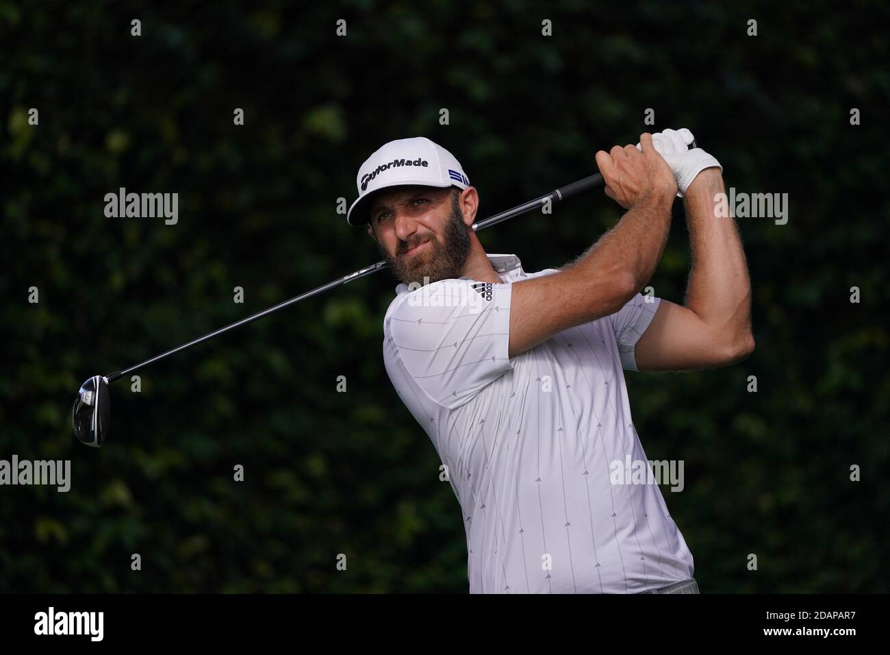 Augusta, United States. 14th Nov, 2020. Dustin Johnson watches his drive off the second tee during the third round of the 2020 Masters golf tournament at Augusta National Golf Club in Augusta, Georgia on Saturday, November 14, 2020. Photo by Kevin Dietsch/UPI Credit: UPI/Alamy Live News Stock Photo