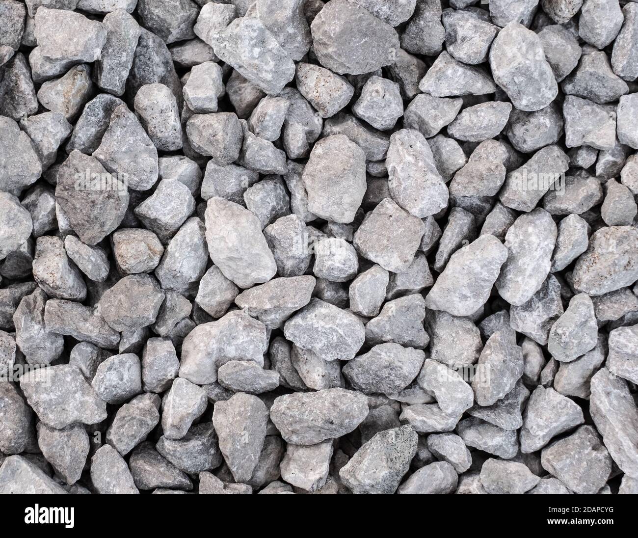 Gray broken rocks, loose gravel, construction and mining business Stock Photo