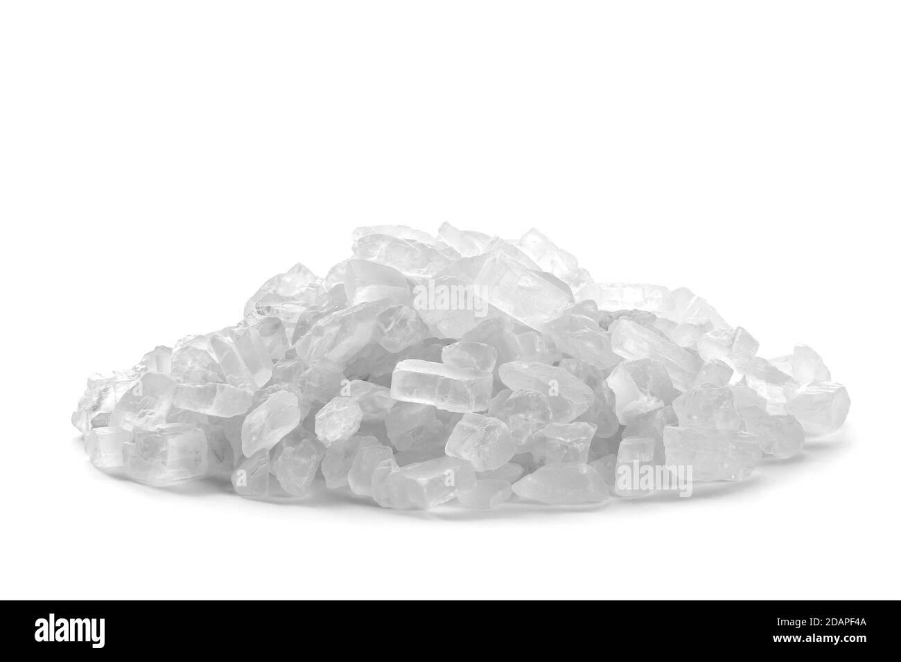 Sea salt crystals isolated on white background. Clipping path included Stock Photo