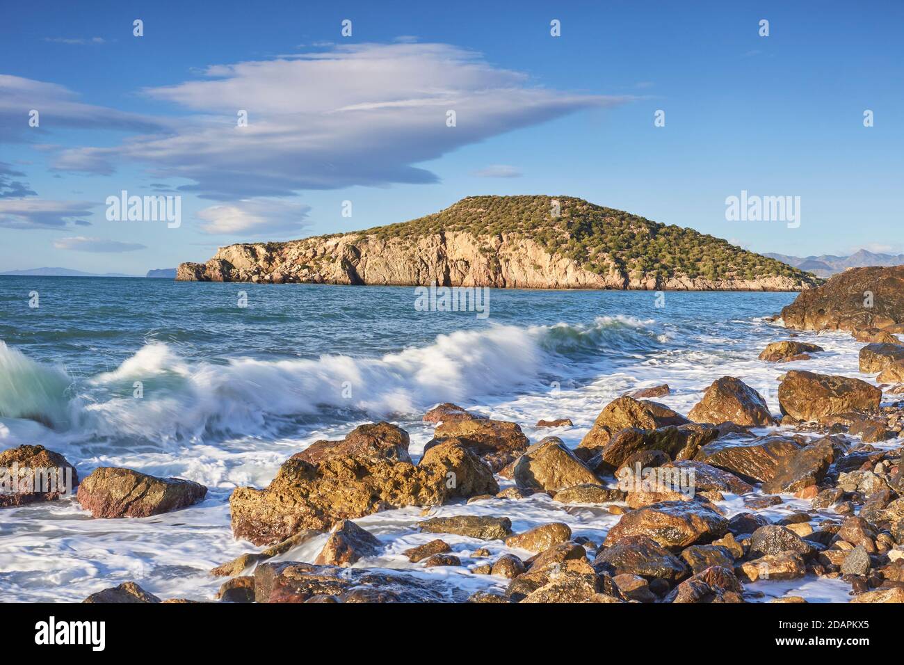Rocky beach and waves in the Mediterranean Sea of Mazarron in the Murcia region. Spain Stock Photo