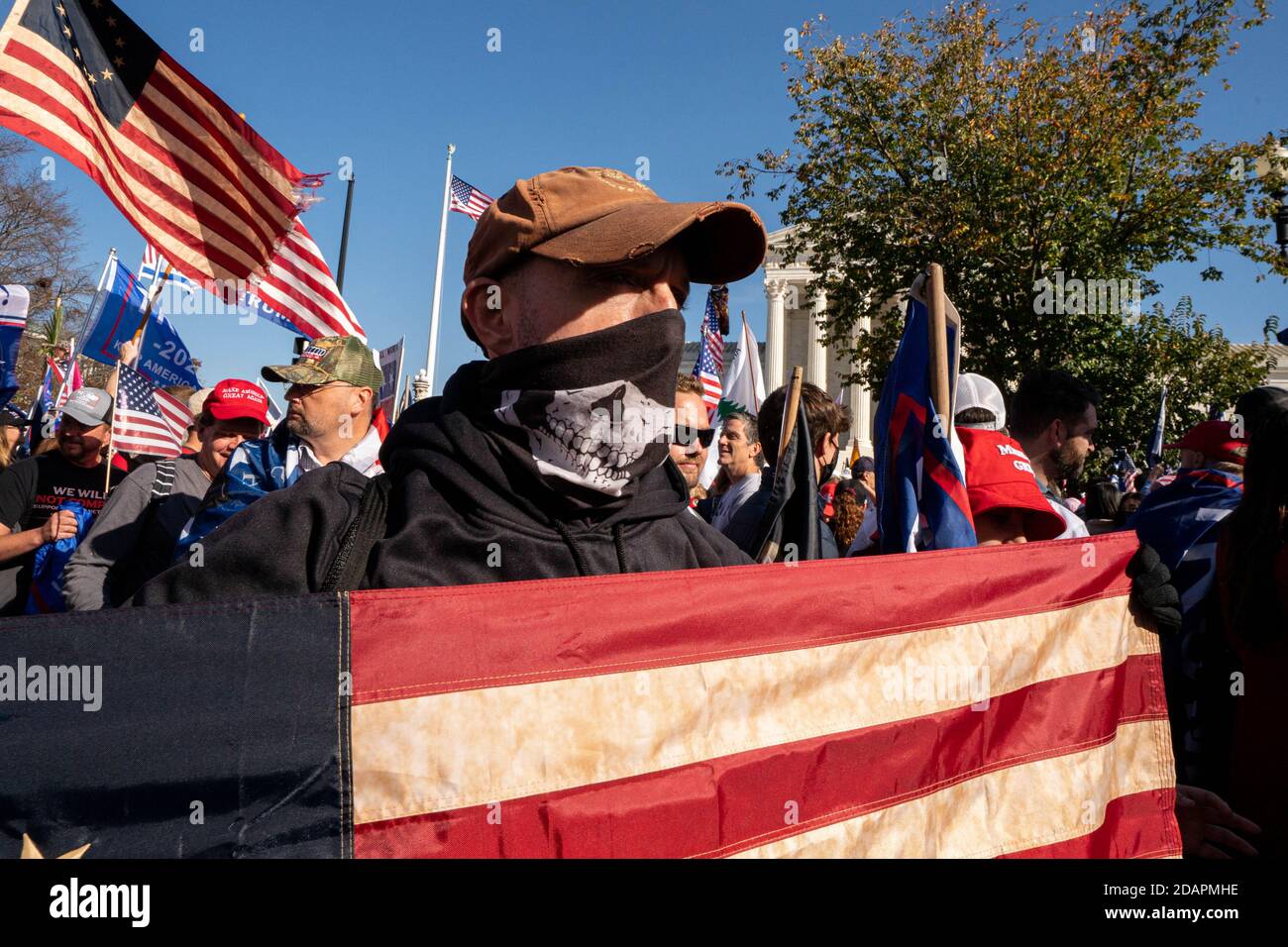 Washington, United States. 14th Nov, 2020. Pro President Trump supporters who are part of the 'Million MAGA March', make their way to the Supreme Court in Washington, DC on Saturday, November 14, 2020. Some of President Trump's staff are pushing to keep him in office in spite of an obvious win for President elect Joe Biden in both electoral and popular votes causing a national security crisis. Photo by Ken Cedeno/UPI Credit: UPI/Alamy Live News Stock Photo