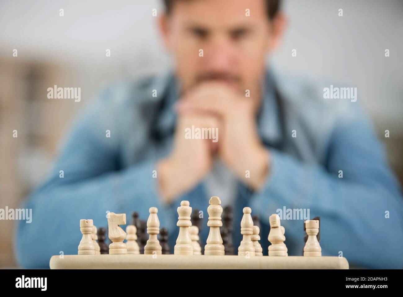 man playing chess Stock Photo