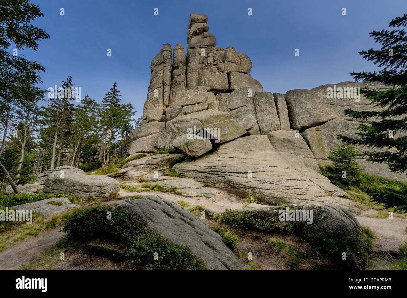 The Pilgrims rock formation (pol. Pielgrzymy, ger. Dreisteine), Karkonosze mountain range (Giants Mountains). Poland, Lower Silesia province. Stock Photo