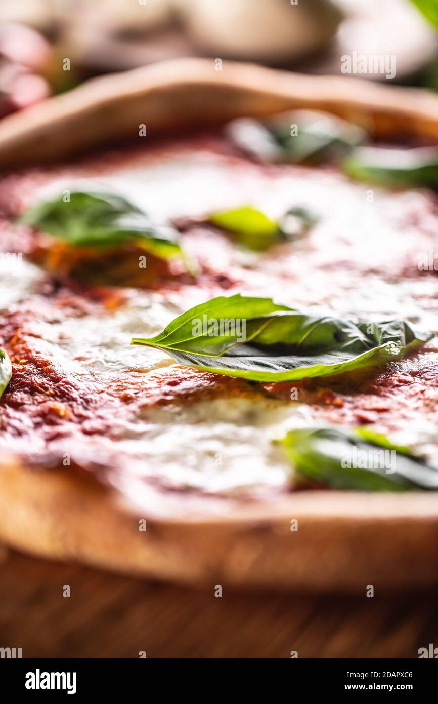 Pizza Napoletana - Napoli tomato sauce mozzarella and basil. Stock Photo