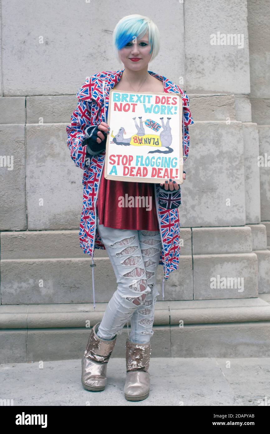 GREAT BRITAIN / England / London / Young female anti brexit protester outside the Houses of Parliament on the 29th January 2019 in London, United Stock Photo