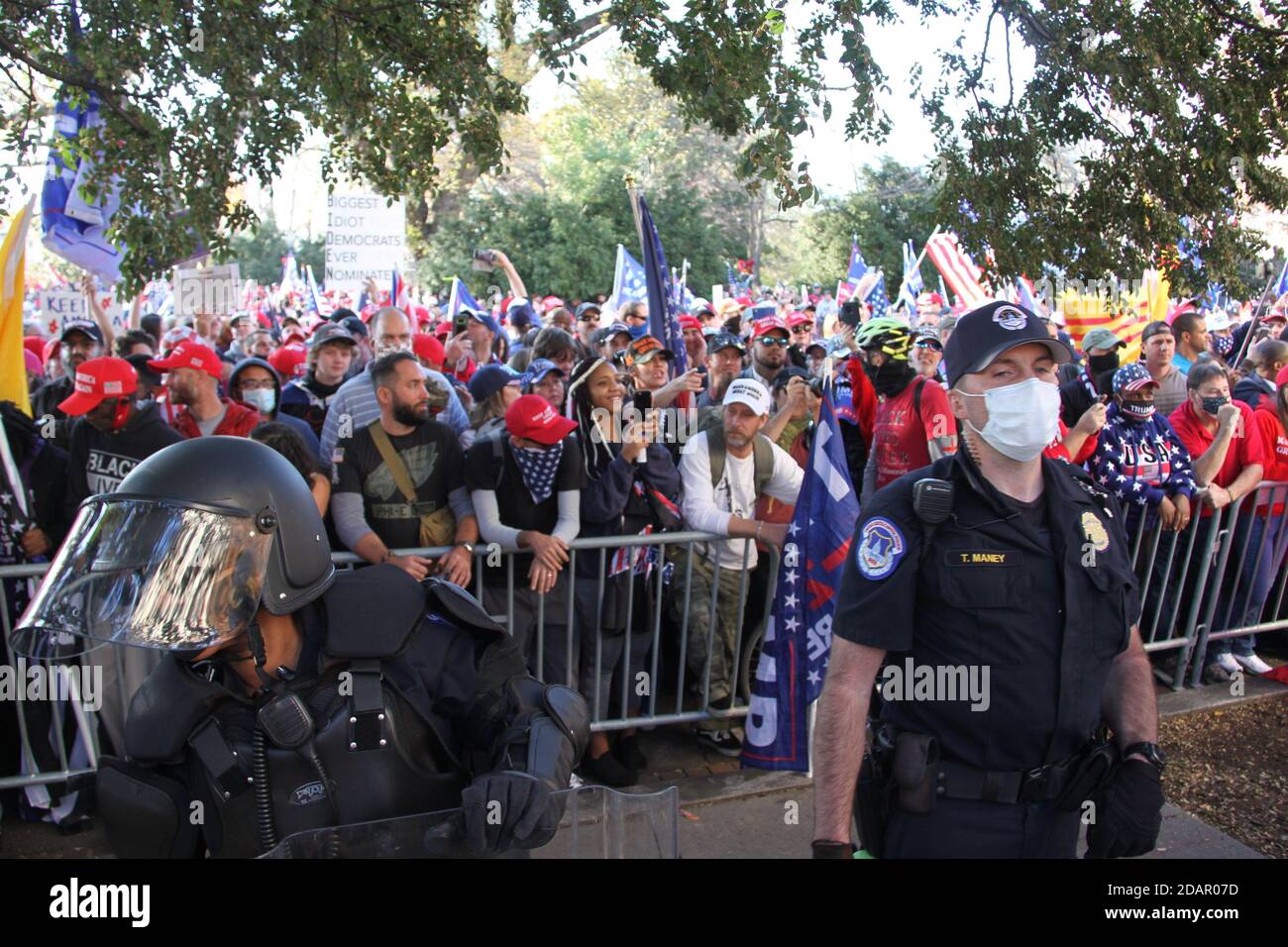 Washington Dc, USA. 14th Nov, 2020. (NEW) Trump and Biden Supporters clash at the Supreme Court in Washington DC. November 14, 2020, Washington DC, Maryland, USA: Trump and Biden supporters clash at the Supreme Court in Washington DC during a TrumpÃ¢â‚¬â„¢s MAGA Million March to show their support for Trump and protest against the Presidential election result which they claim to be fraudulent. There were some Police Officers to provide security between them .Credit : Niyi Fote /Thenews2. Credit: Niyi Fote/TheNEWS2/ZUMA Wire/Alamy Live News Stock Photo