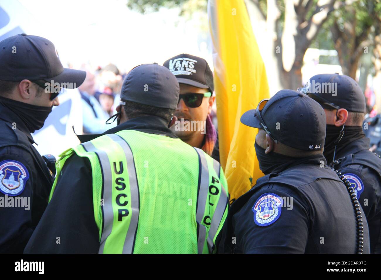 Washington Dc, USA. 14th Nov, 2020. (NEW) Trump and Biden Supporters clash at the Supreme Court in Washington DC. November 14, 2020, Washington DC, Maryland, USA: Trump and Biden supporters clash at the Supreme Court in Washington DC during a TrumpÃ¢â‚¬â„¢s MAGA Million March to show their support for Trump and protest against the Presidential election result which they claim to be fraudulent. There were some Police Officers to provide security between them .Credit : Niyi Fote /Thenews2. Credit: Niyi Fote/TheNEWS2/ZUMA Wire/Alamy Live News Stock Photo