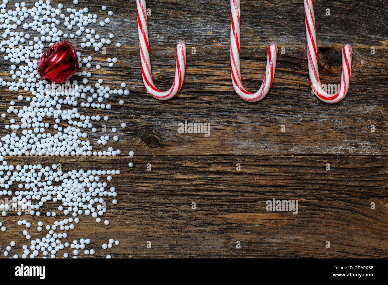 Rustic wood with candy canes background Stock Photo - Alamy