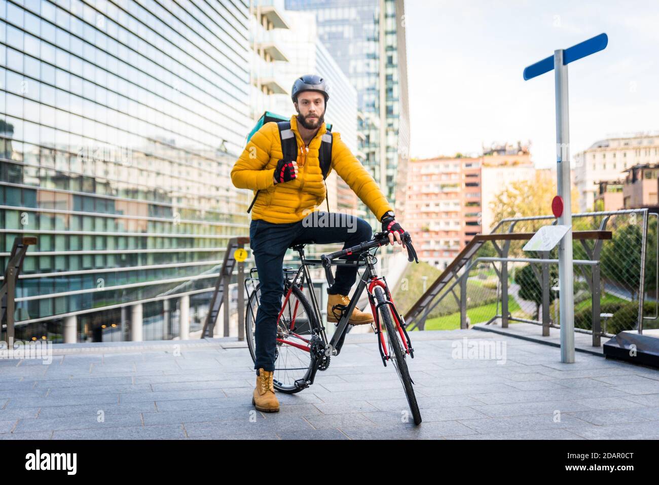 Food delivery service, rider delivering food to clints with bicycle