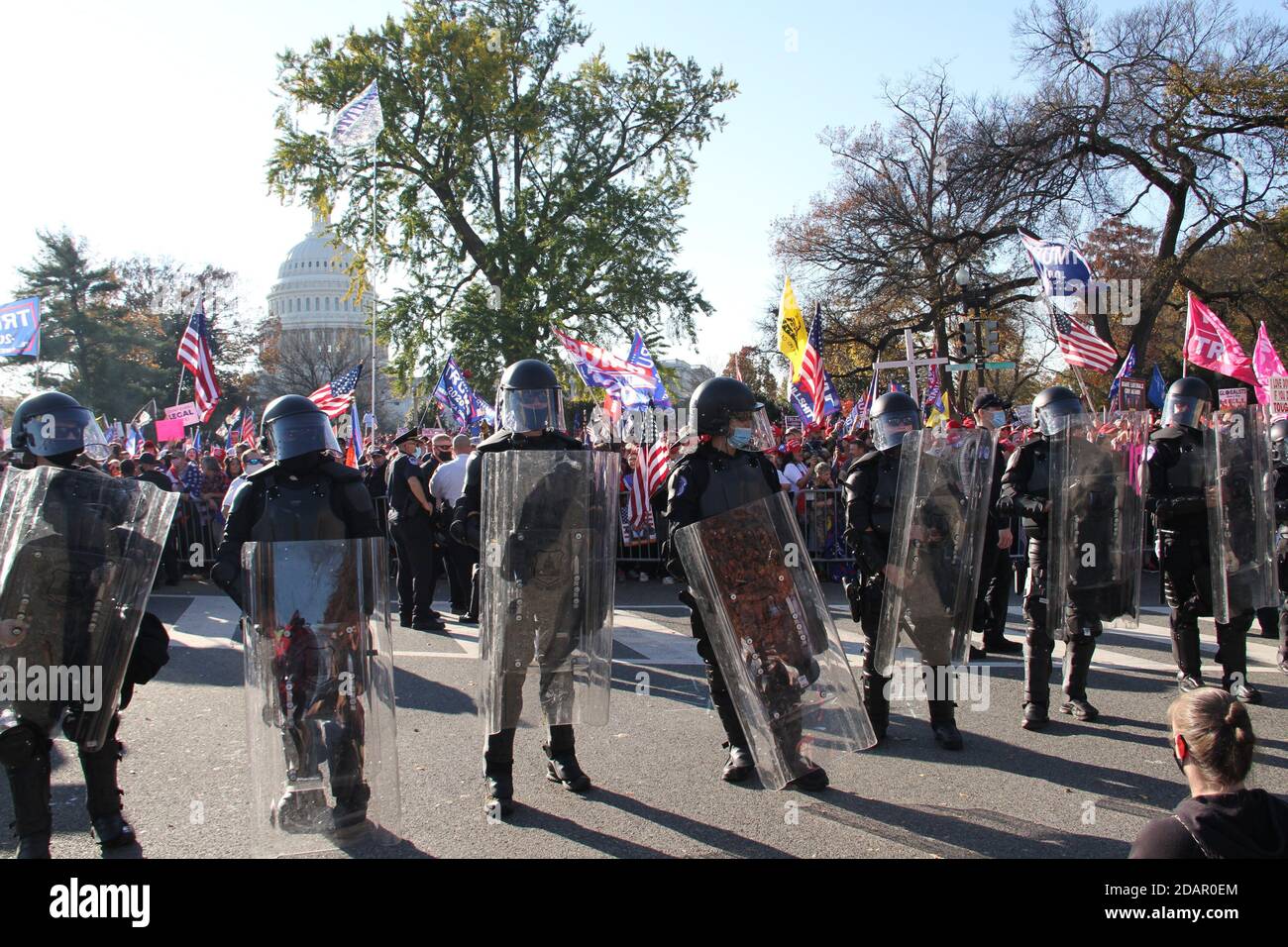 Washington Dc, USA. 14th Nov, 2020. (NEW) Trump and Biden Supporters clash at the Supreme Court in Washington DC. November 14, 2020, Washington DC, Maryland, USA: Trump and Biden supporters clash at the Supreme Court in Washington DC during a TrumpÃ¢â‚¬â„¢s MAGA Million March to show their support for Trump and protest against the Presidential election result which they claim to be fraudulent. There were some Police Officers to provide security between them .Credit : Niyi Fote /Thenews2. Credit: Niyi Fote/TheNEWS2/ZUMA Wire/Alamy Live News Stock Photo