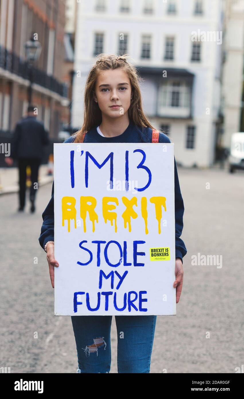 A anti-brexit protester holds a placard'I am marching against Brexit today because Brexit stole my Future during Anti Brexit protest on March 23, 2019 Stock Photo
