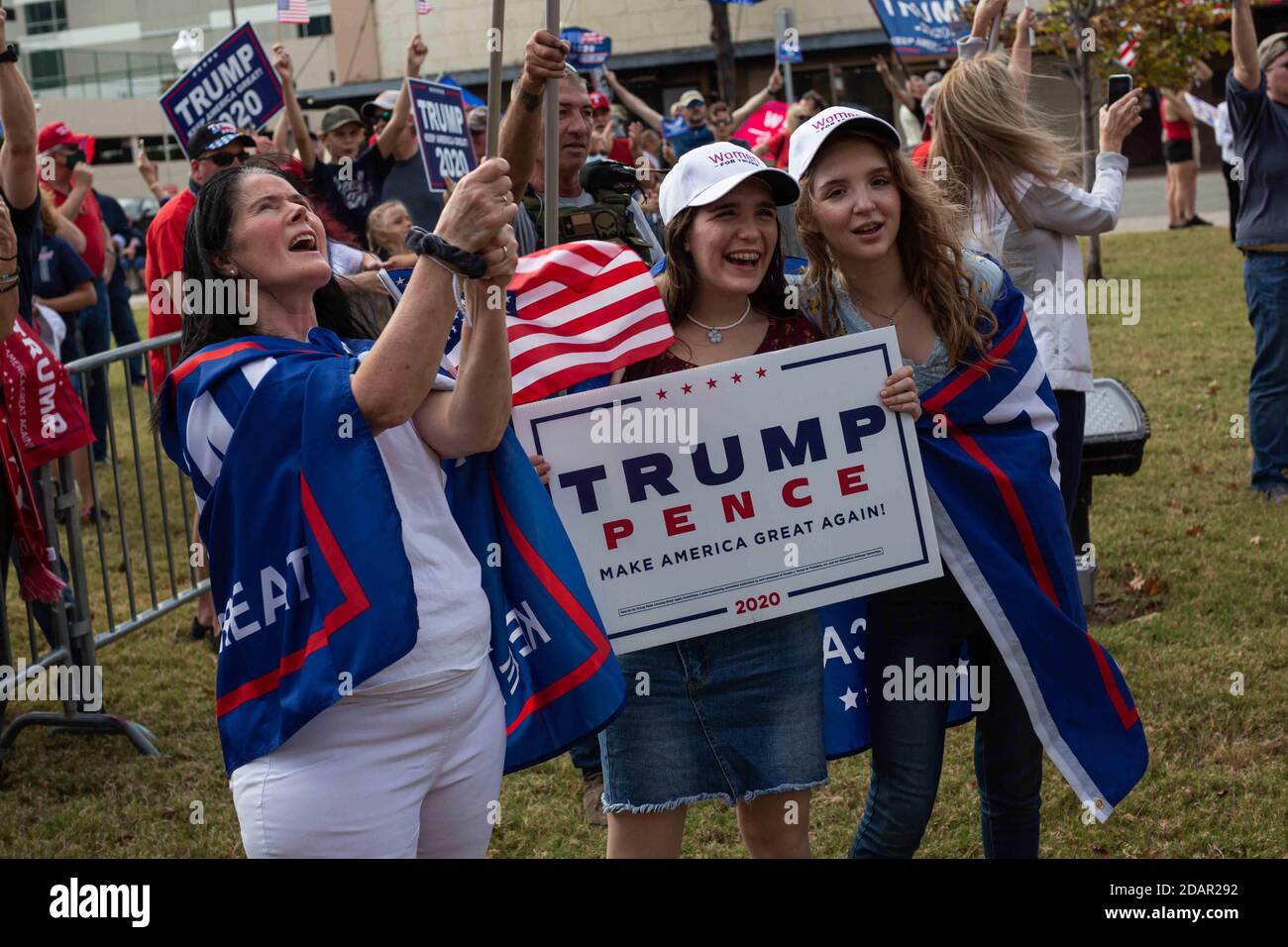 Fort Worth, Texas, USA. 14th Nov, 2020. 11/14/20 Fort Worth, Texas - Three women from Wichita Falls smile and chant while a massive crowd of Trump Supporters protests the 2020 Presidential Election in Fort Worth, Texas. Credit: Chris Rusanowsky/ZUMA Wire/Alamy Live News Stock Photo