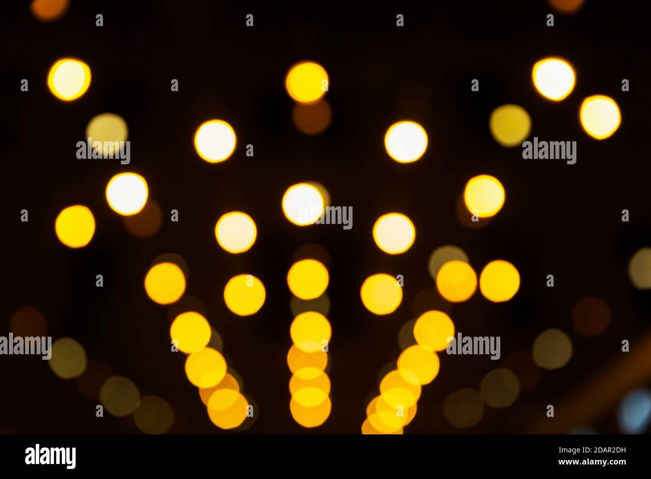 Abstract dark background with sparkling yellow lights, Budapest