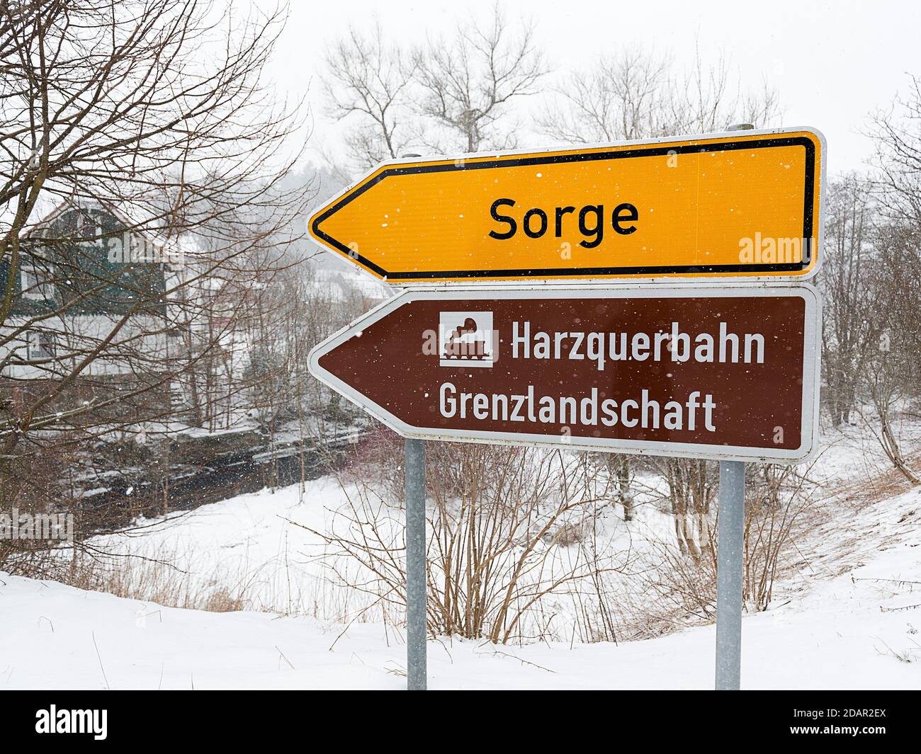 Direction signs to Sorge and to the Harzquerbahn border landscape, dreary winter weather, Oberharz am Brocken, Harz district, Saxony-Anhalt, Germany Stock Photo