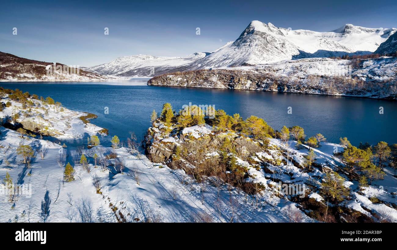 Winter fjord landscape, snowy mountains, arctic vegetation, Gildeskal, Nordland, Norway Stock Photo