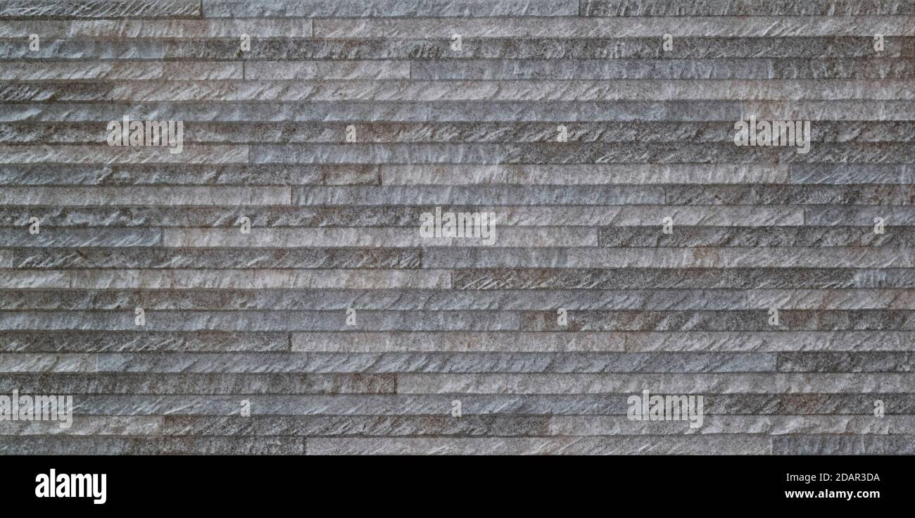 rustic wall texture formed by small bricks Stock Photo