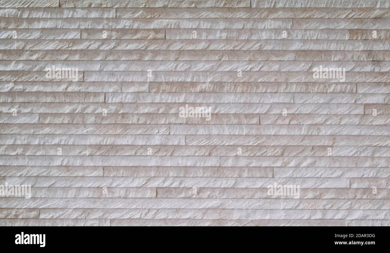 rustic wall texture formed by small bricks Stock Photo