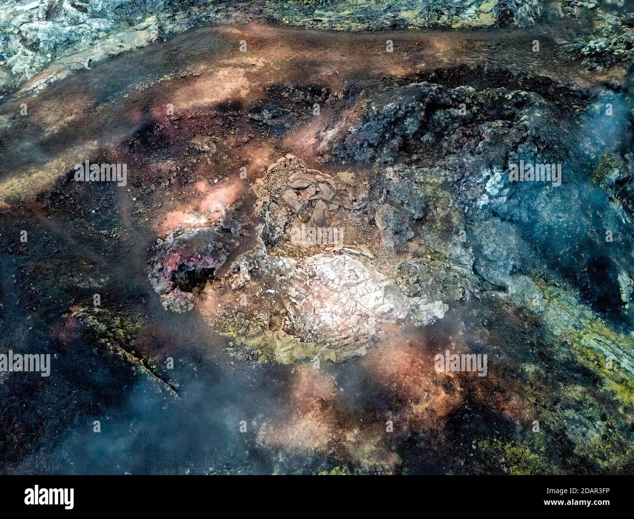 Aerial view Steaming crater with colorful rocks in the Krafla lava field, Skutustaoir, Norourland eystra, Iceland Stock Photo