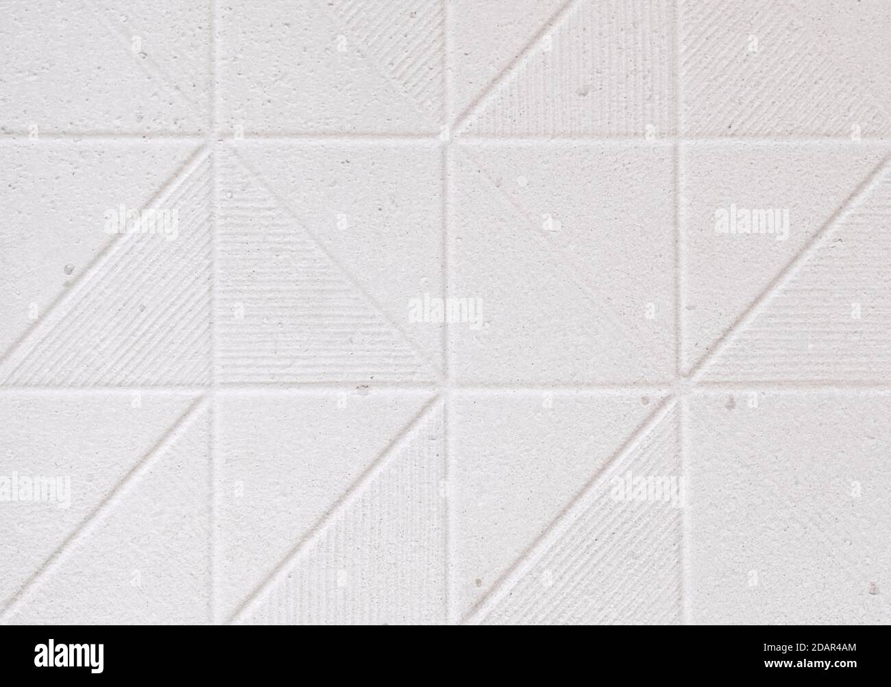 white wall background with various forms of ornamentation Stock Photo