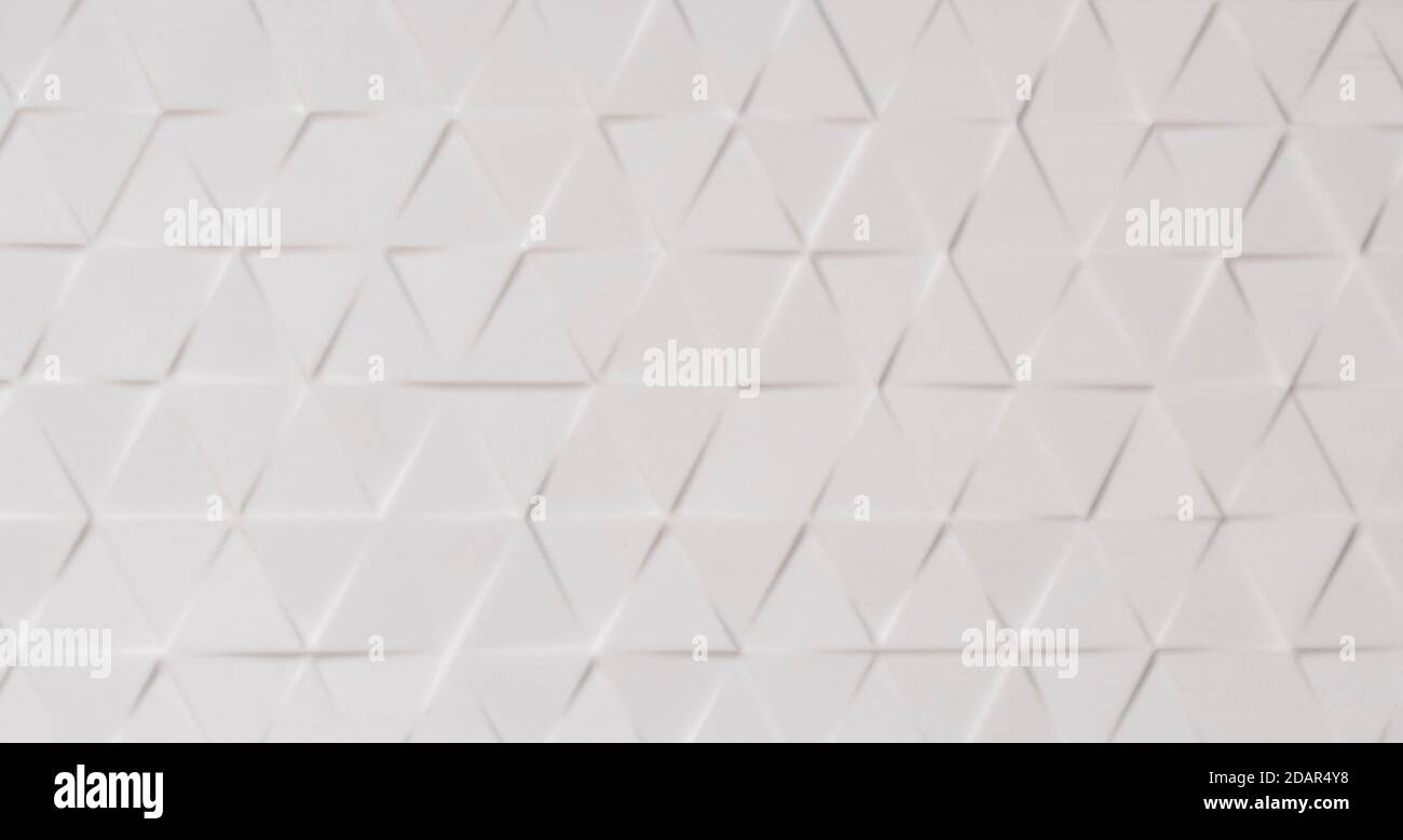 white wall background with various forms of ornamentation Stock Photo