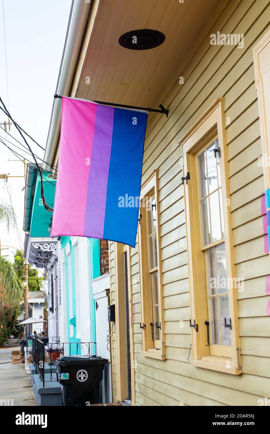 bisexual bi rainbow coloured flag hanging in New Orleans Louisiana Stock Photo
