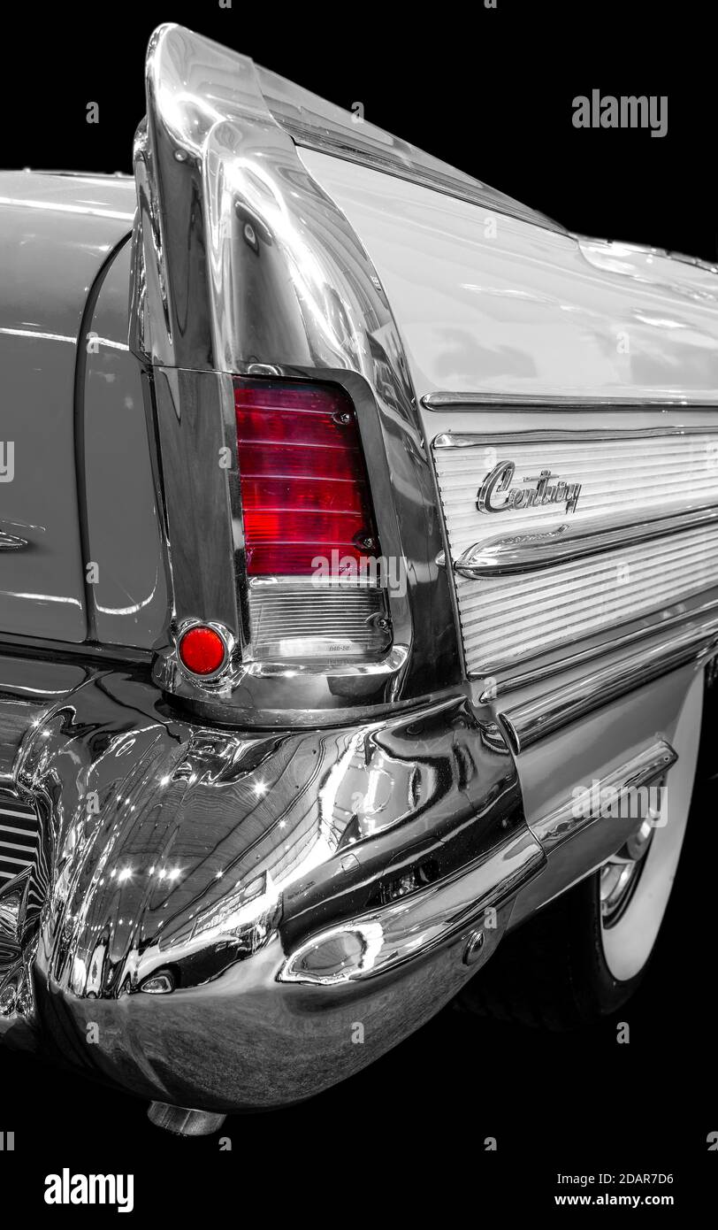 Oldtimer detail, Buick Century 1958, in black and white, with red brake light Stock Photo