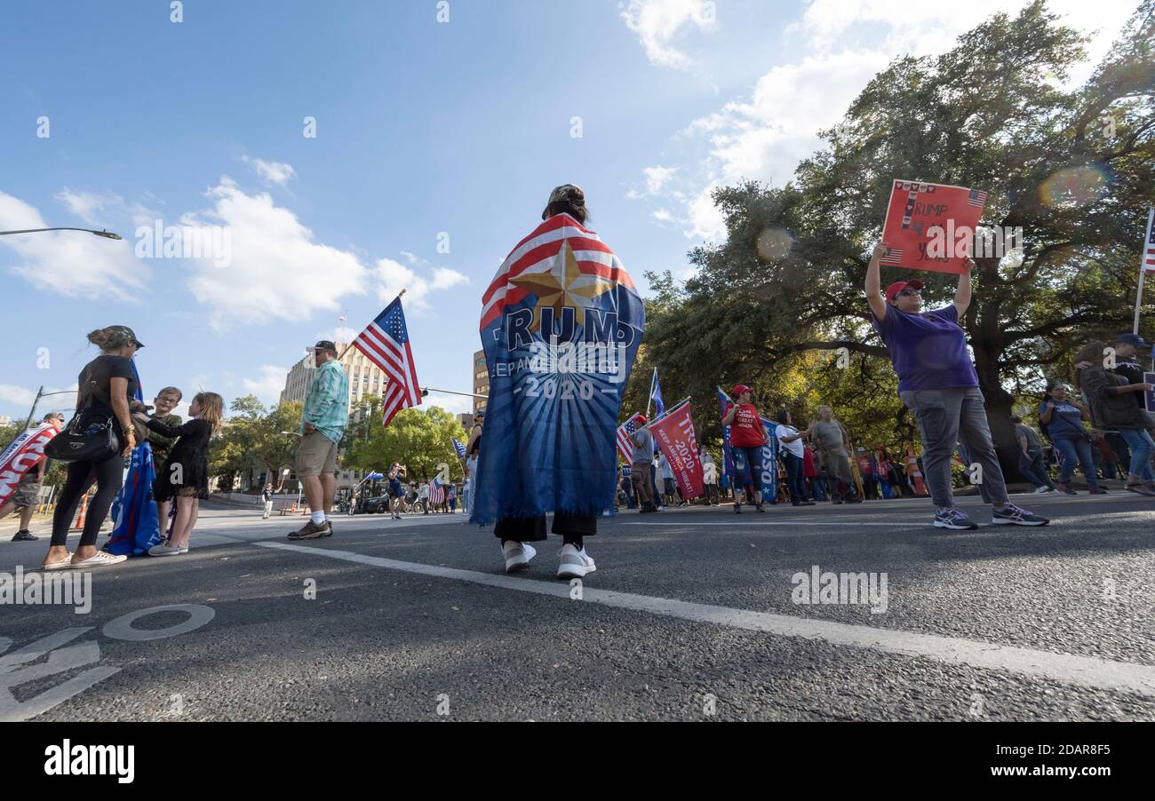 Austin, TX USA November 14, 2020: Several hundreds supporters of Pres. Donald Trump rally near the Texas Capitol, adamant that the president should not concede to Joe Biden until cases of election fraud are investigated and all votes counted. So far no widespread cases of illegal voting have arisen almost two weeks after the election. Credit: Bob Daemmrich/Alamy Live News Stock Photo