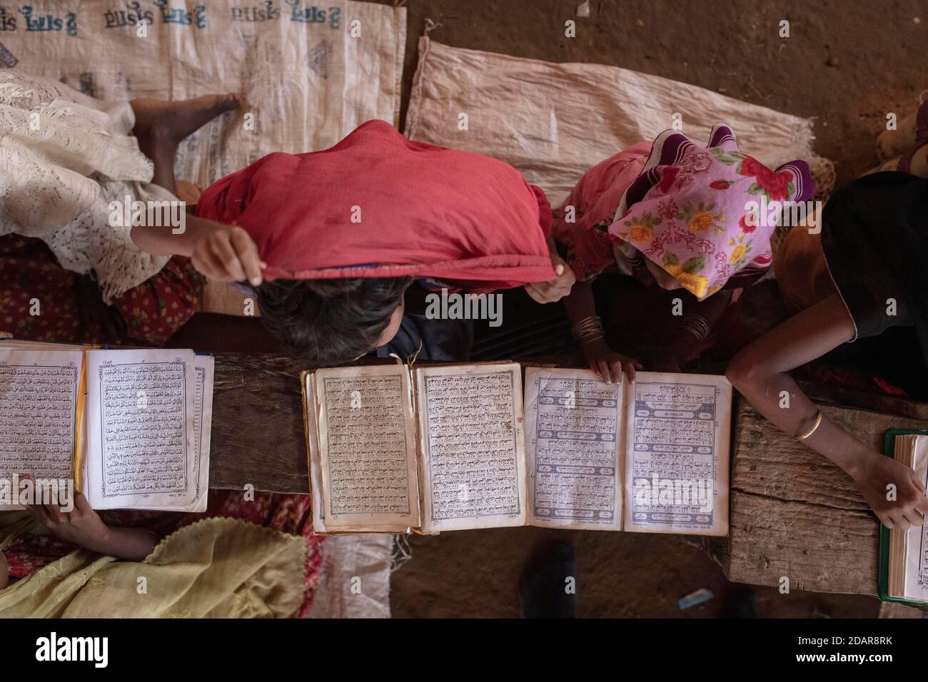 Girls reading in a madrasah, Koran school, camp for Rohingya refugees ...