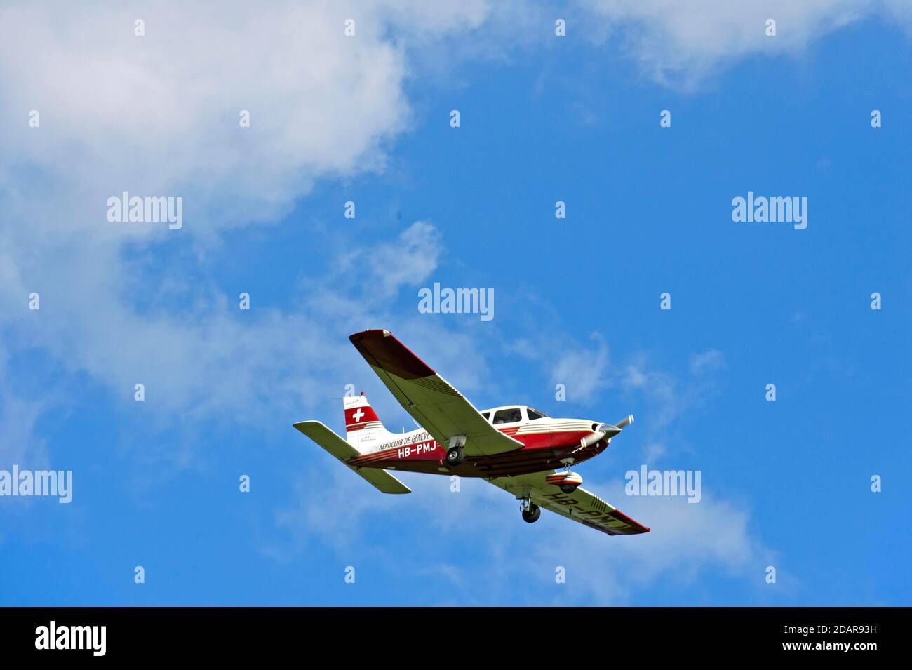 Piper PA-28-236 of the flying club Aero Club de Geneve approaching Geneva Airport, Switzerland Stock Photo