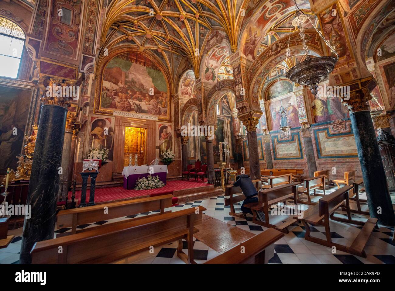 Tabernacle on decorated ceiling, ceiling paintings with angels in the side chapel, Capilla del Sagrario, Mezquita-Catedral de Cordoba or Cathedral Stock Photo