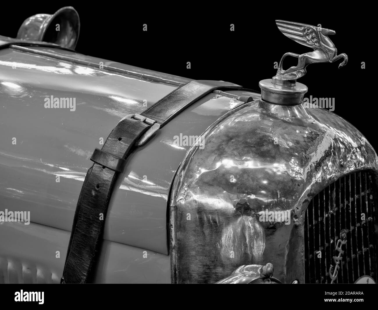 Radiator mascot from classic car Amilcar CGS, in black and white Stock Photo