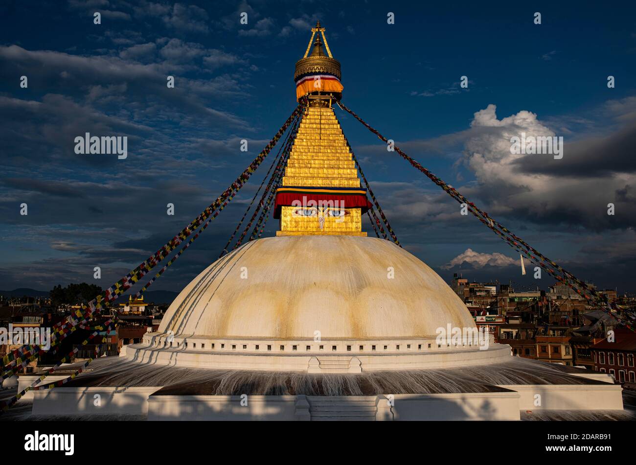 Boudha Stupa with the all-seeing eyes of Buddha in the evening light, Boudanath, also Bodnath, Buddhist sanctuary and pilgrimage site in Kathmandu Stock Photo