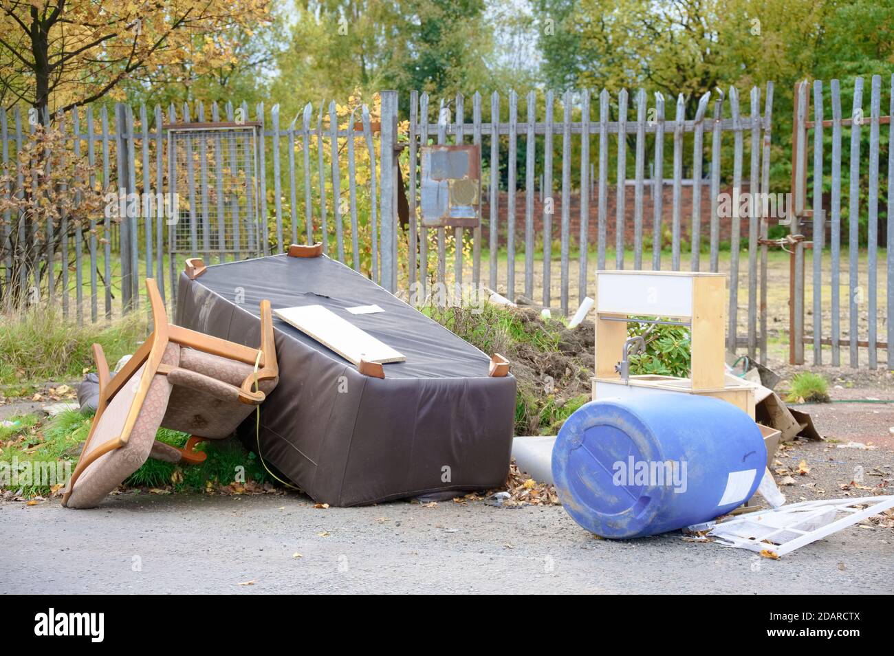 Poor council flats with fly tipping of rubbish outdoors Inverclyde