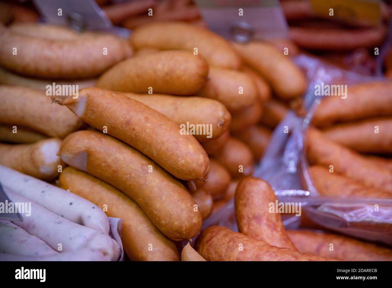 Sausages at a stand in a butcher's shop. Stock Photo