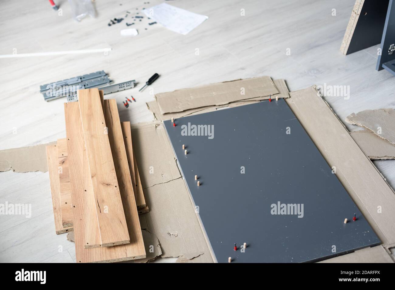 Assembling furniture installation of shelves with new apartment a shelf