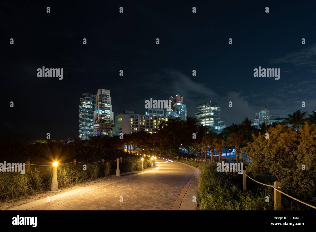 Miami Light Path Beach pathway Miami FL USA at night Stock Photo - Alamy