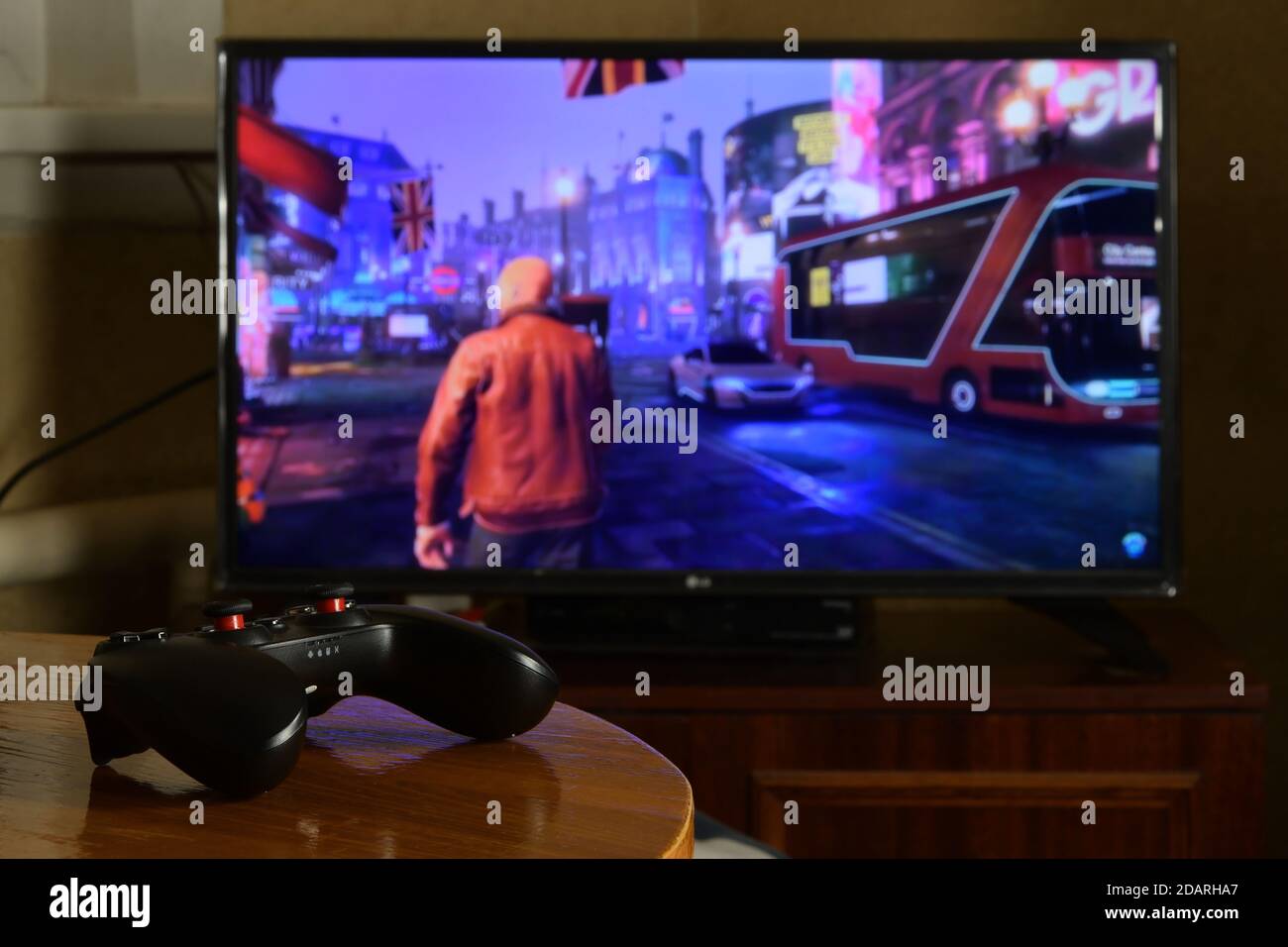 KHARKOV, UKRAINE - NOVEMBER 12, 2020: Video game controller Gamesir g3s on  table with Watch Dogs Legion game on big display Stock Photo - Alamy
